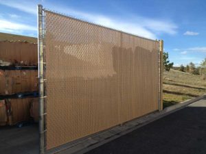 Privacy chain link fence installed by Waters & Son Construction
